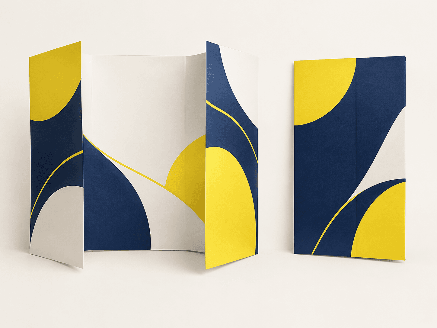 Gate-fold brochure opened to reveal its center spread