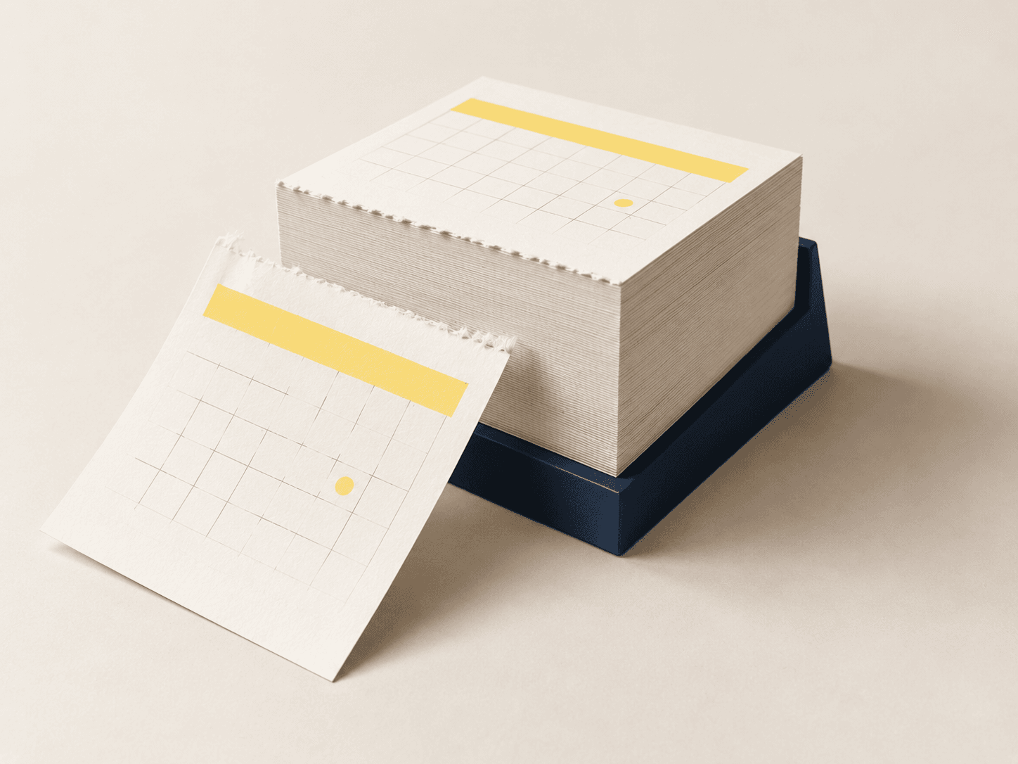 Tear-off desk calendar with a bound block of dated pages